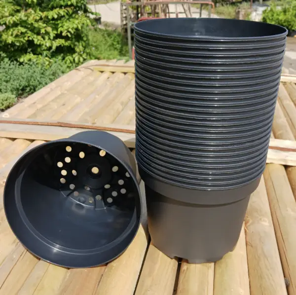 3 Litre black Pots, durable plastic planting containers ideal for nurturing young plants and seedlings in UK gardens.