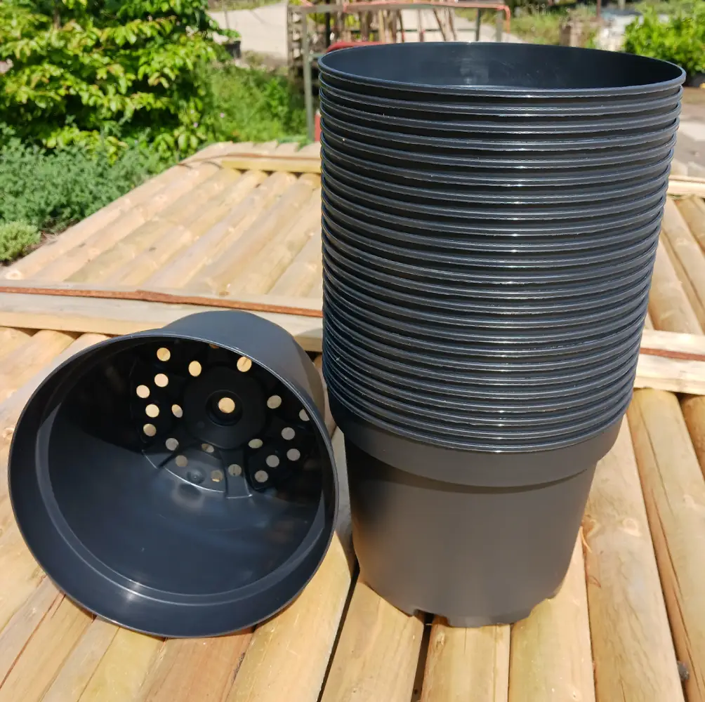 3 Litre black Pots, durable plastic planting containers ideal for nurturing young plants and seedlings in UK gardens.