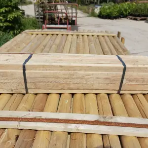 Wooden Stakes (90cm), sturdy wooden supports designed to secure plants, trees, and garden structures, ideal for use in UK gardens