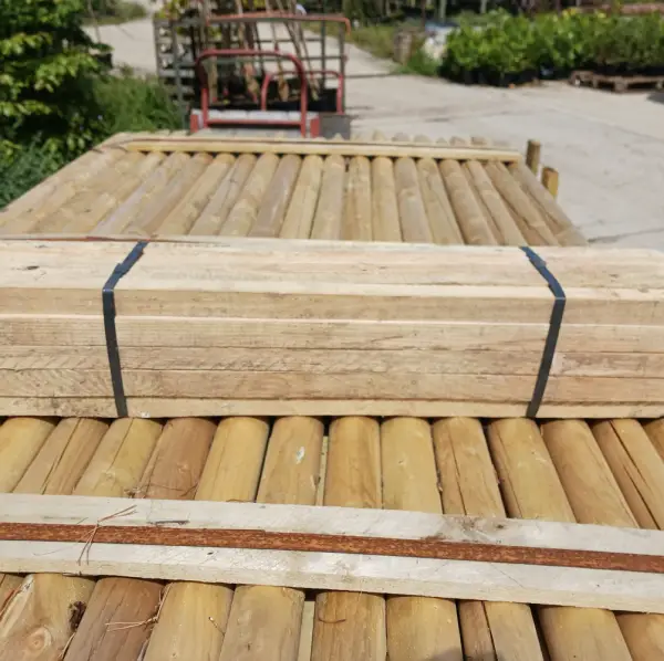 Wooden Stakes (90cm), sturdy wooden supports designed to secure plants, trees, and garden structures, ideal for use in UK gardens