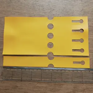 A close-up of Vinyl Labels (Yellow), durable weather-resistant tags designed for garden organisation and plant identification, ideal for use in UK gardens.